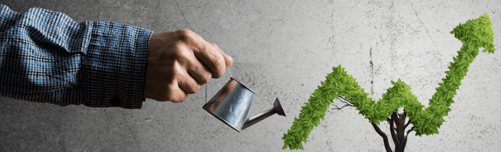 Man watering tree shaped like growth arrow