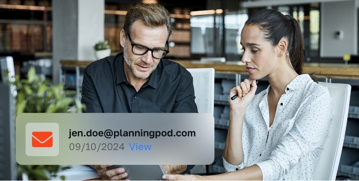 two people checking emails on their tablet